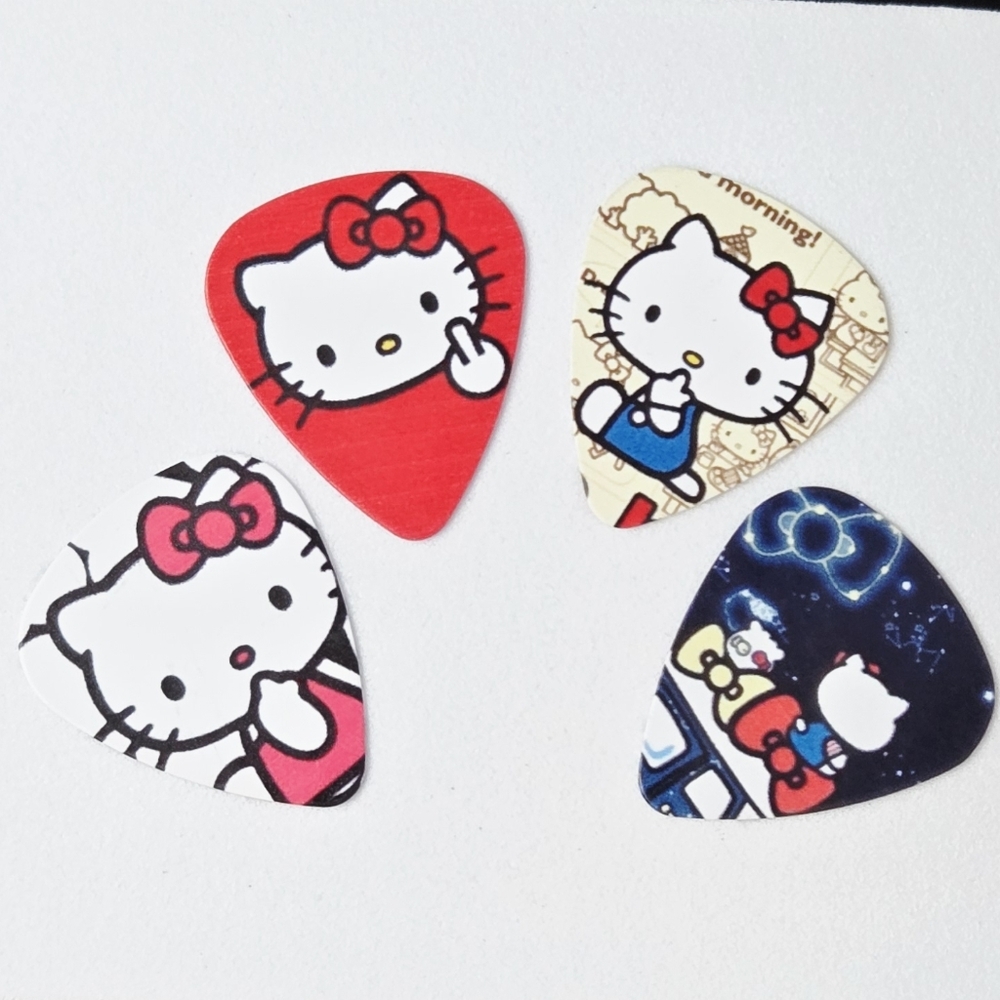 Hello Kitty Guitar Picks Set 4pcs .71mm Edgy Kawaii Plectrum Pack Cheeky Sassy - Picture 2 of 3